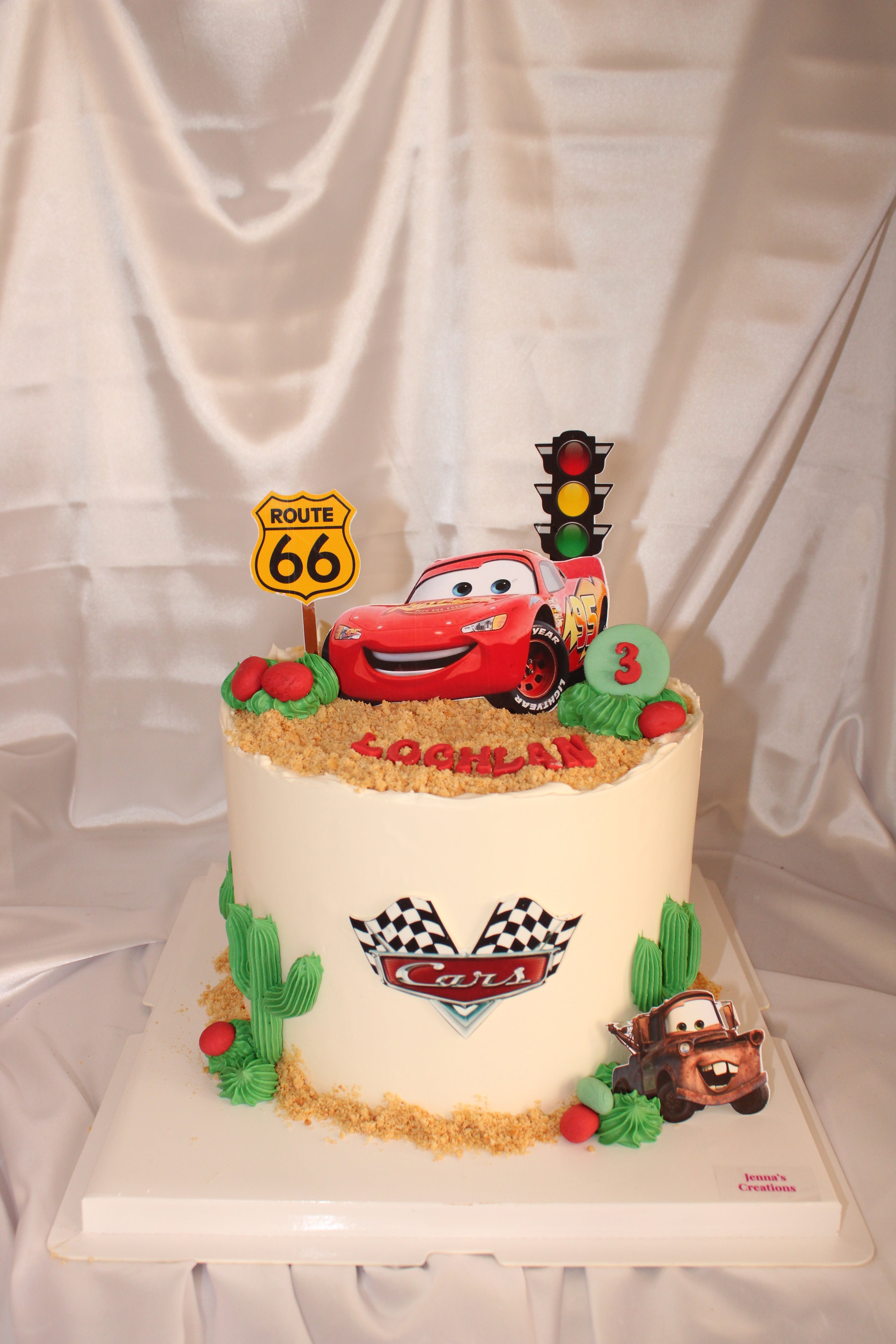 Children's pillow with a car design and road elements on a white background