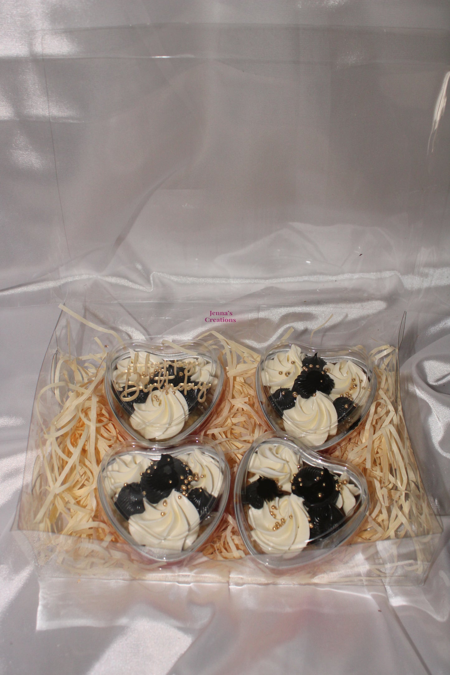 Luxury heart cake tub with piped buttercream and decorative pearl finish.