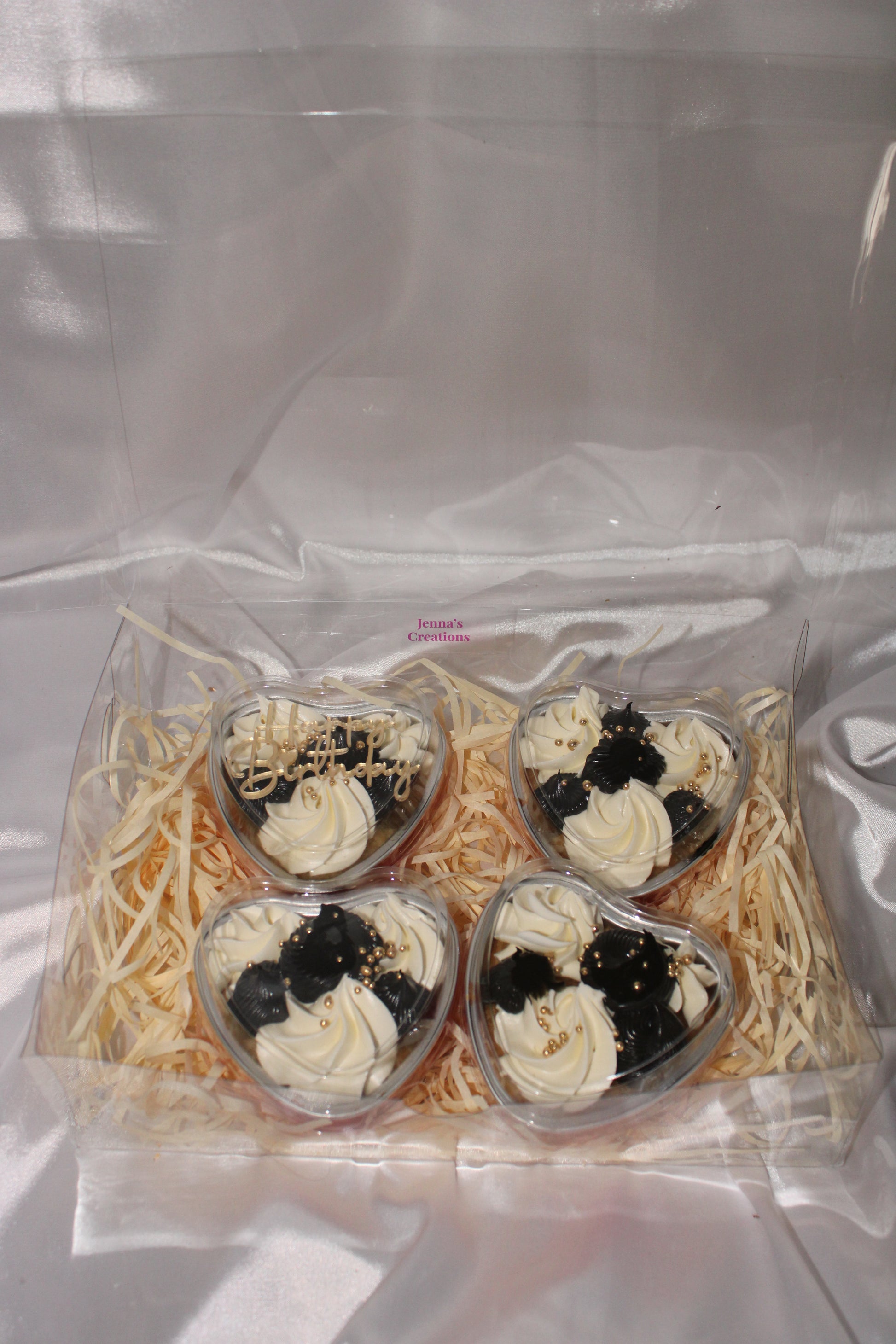 Luxury heart cake tub with piped buttercream and decorative pearl finish.