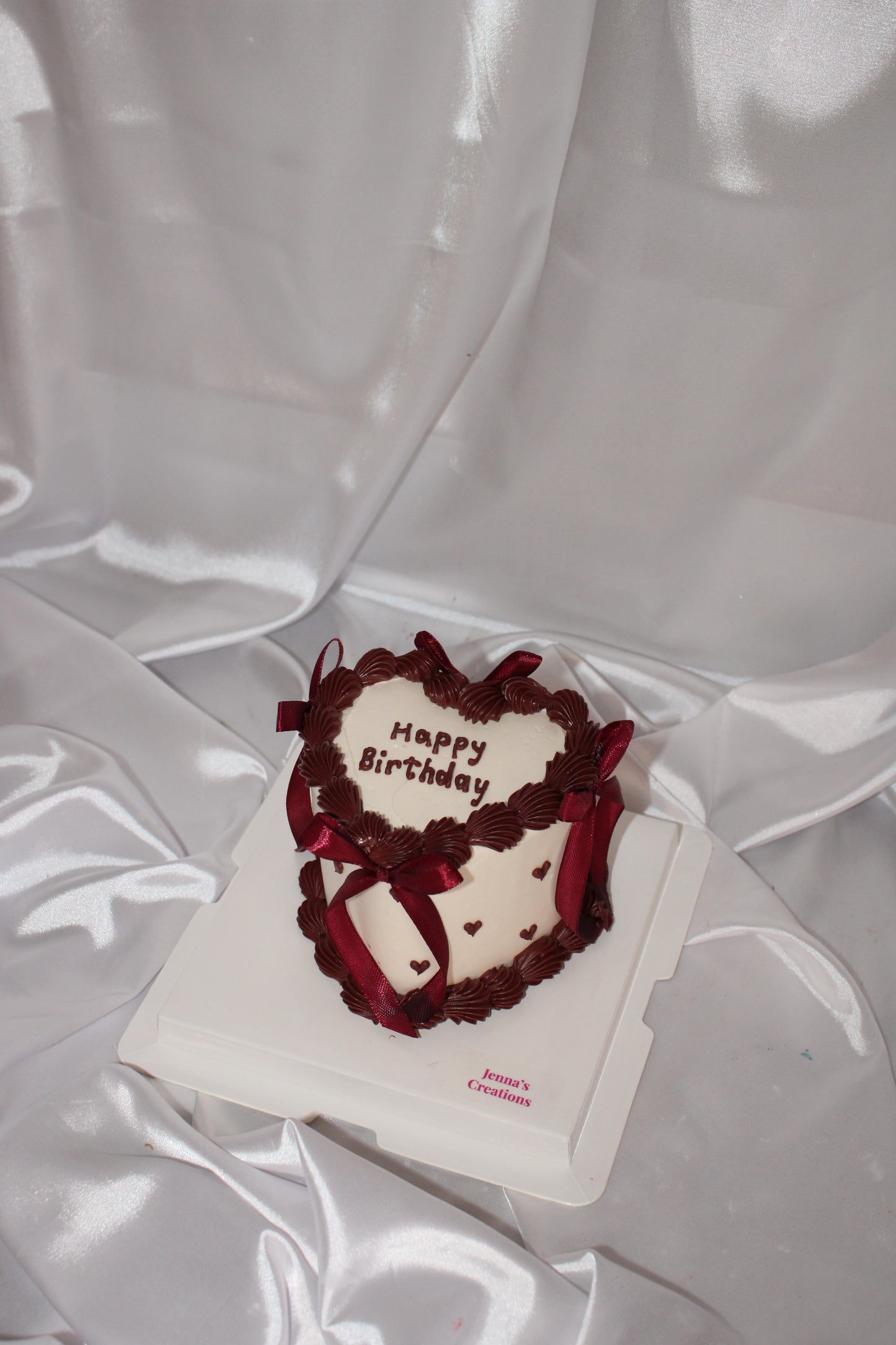 white and maroon heart bento cake